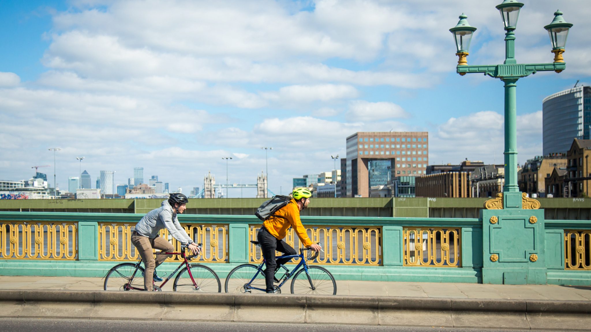 Two cyclists on Southwark Bridge